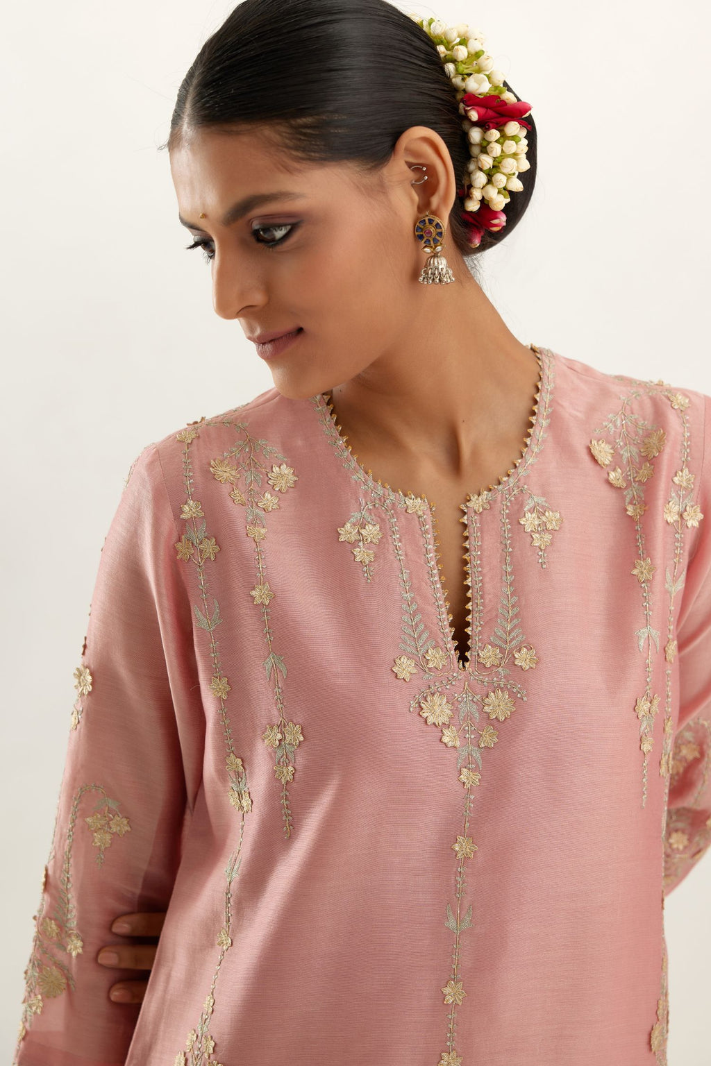 Pink silk chanderi straight kurta set, highlighted with gold zari and gota embroidery.