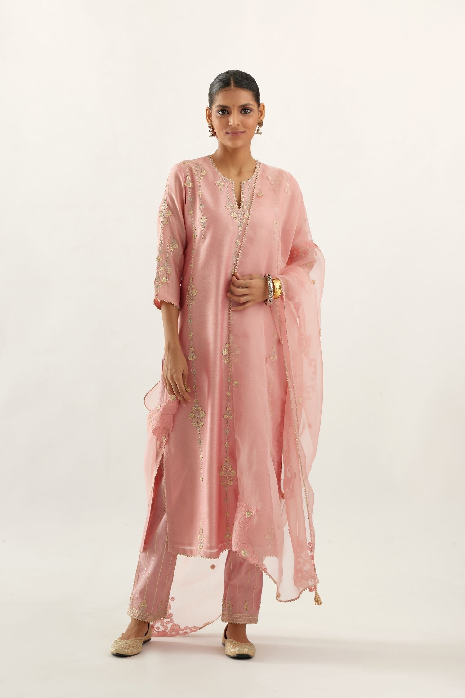 Pink silk chanderi straight kurta set, highlighted with gold zari and gota embroidery.