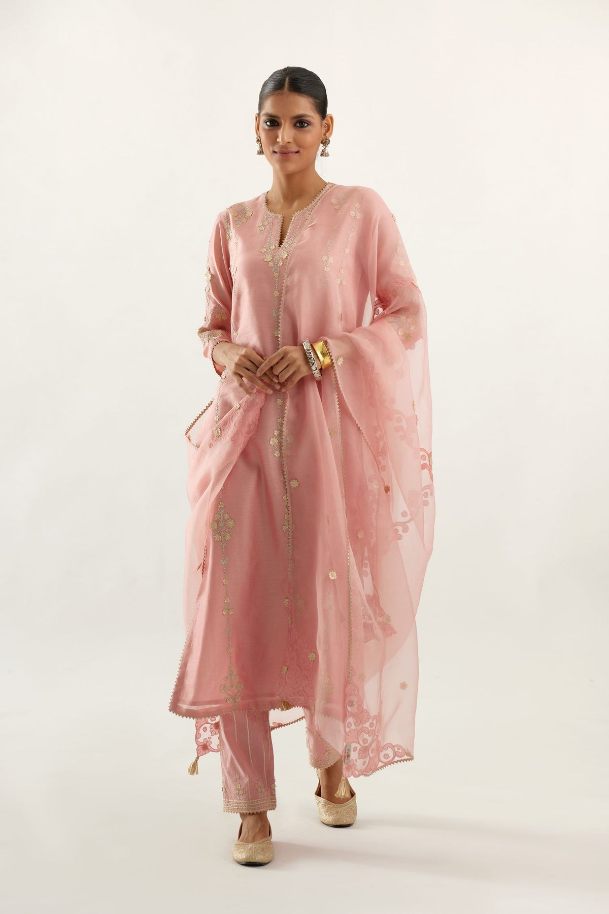 Pink silk chanderi straight kurta set, highlighted with gold zari and gota embroidery.