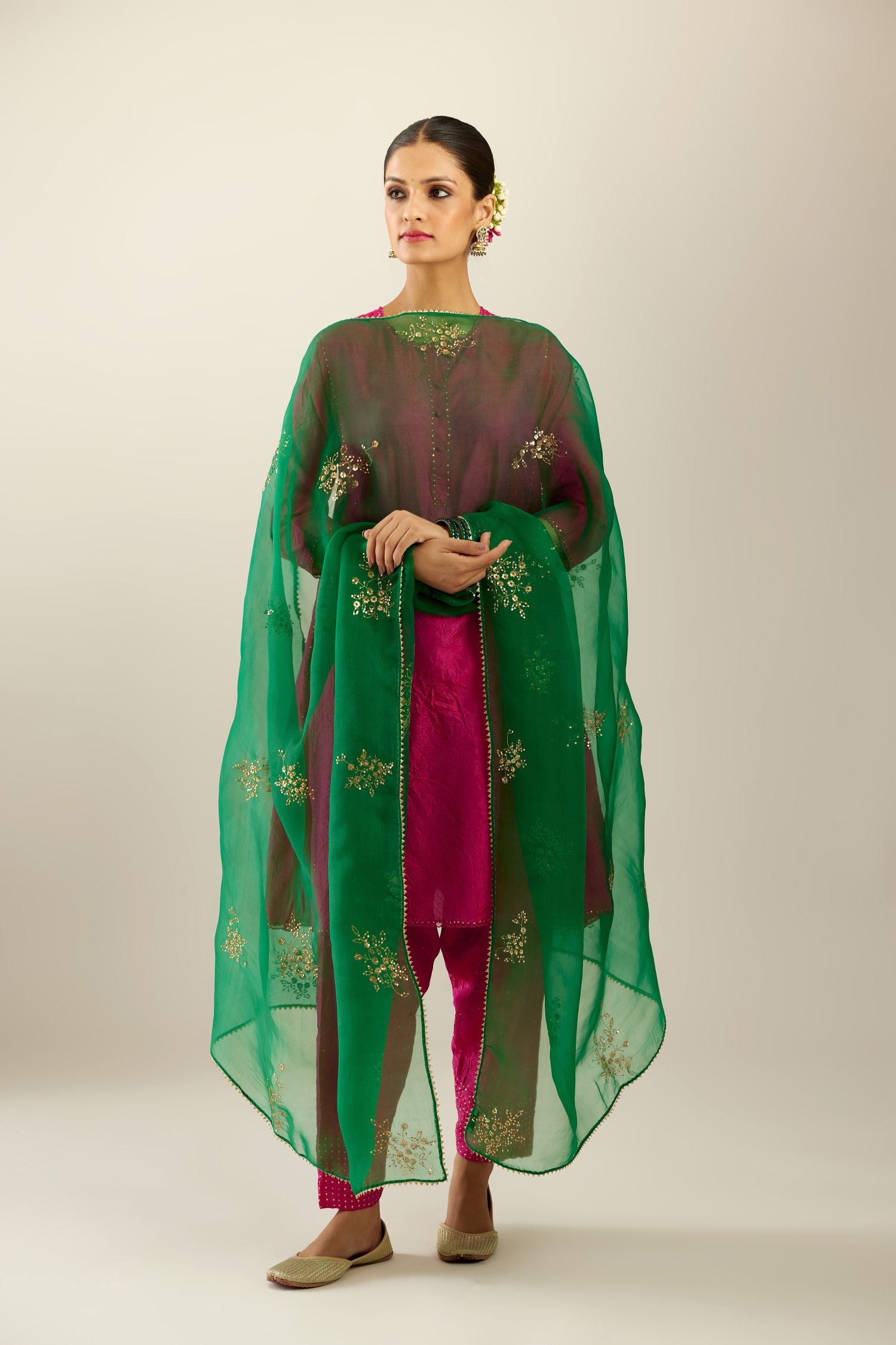 Silk hand crushed short kalidar kurta set with button placket, highlighted with gold sequins and embroidered scalloped organza at edges.