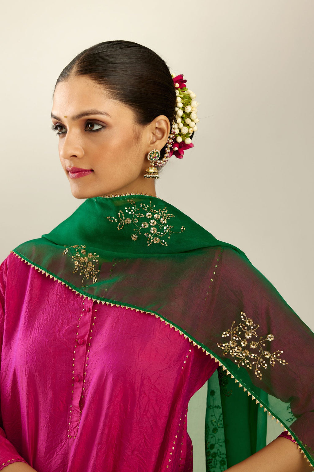 Silk hand crushed short kalidar kurta set with button placket, highlighted with gold sequins and embroidered scalloped organza at edges.