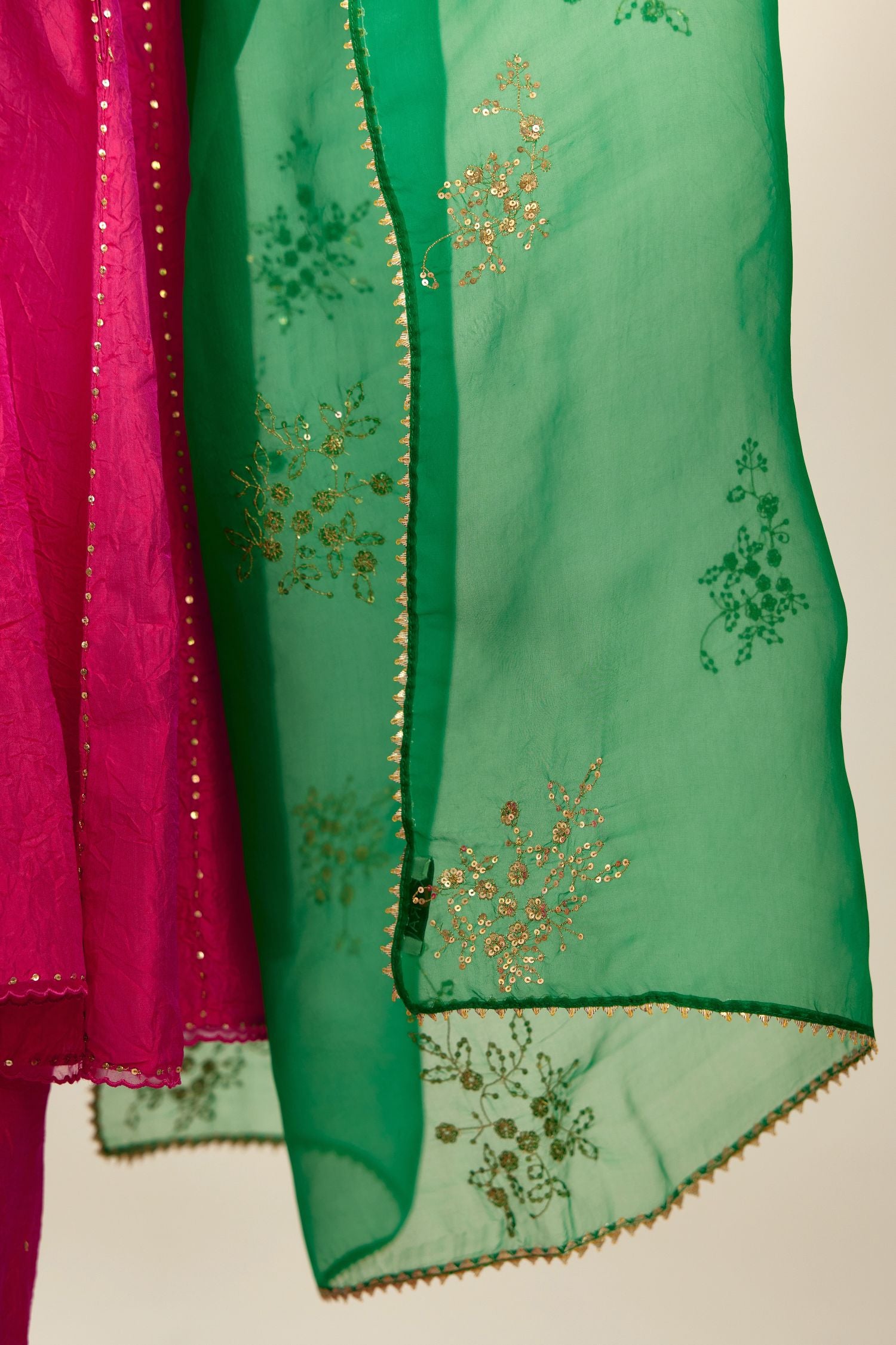 Silk hand crushed short kalidar kurta set with button placket, highlighted with gold sequins and embroidered scalloped organza at edges.