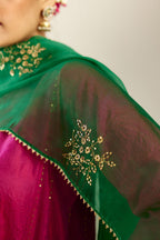 Silk hand crushed short kalidar kurta set with button placket, highlighted with gold sequins and embroidered scalloped organza at edges.
