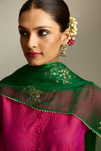 Silk hand crushed short kalidar kurta set with button placket, highlighted with gold sequins and embroidered scalloped organza at edges.