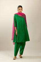 Silk hand crushed short kalidar kurta set with button placket, highlighted with gold sequins and embroidered scalloped organza at edges.