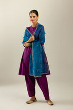 Silk hand crushed short kalidar kurta set with button placket, highlighted with gold sequins and embroidered scalloped organza at edges.