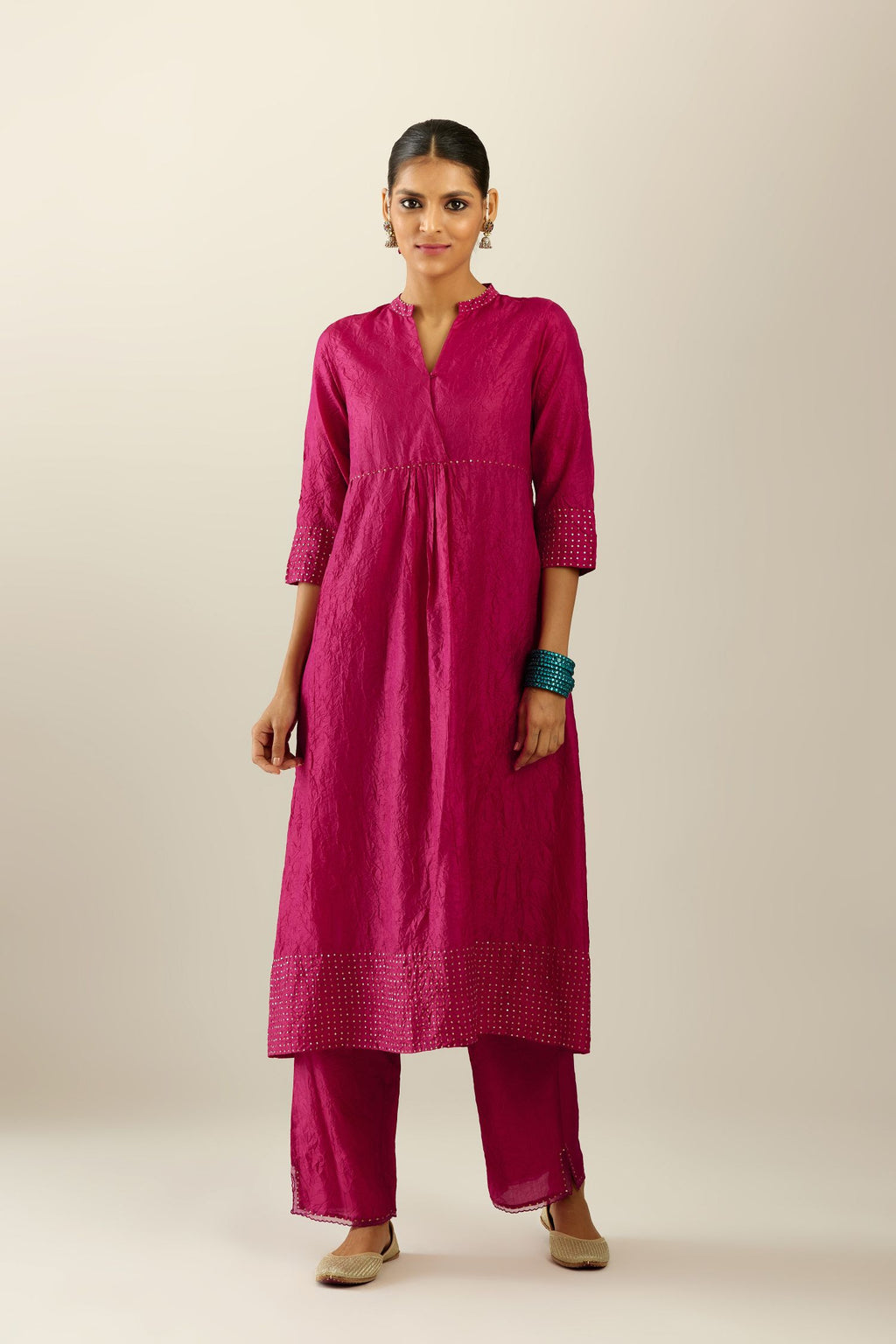 Jazzberry jam silk hand crushed kurta set, highlighted with sequins.