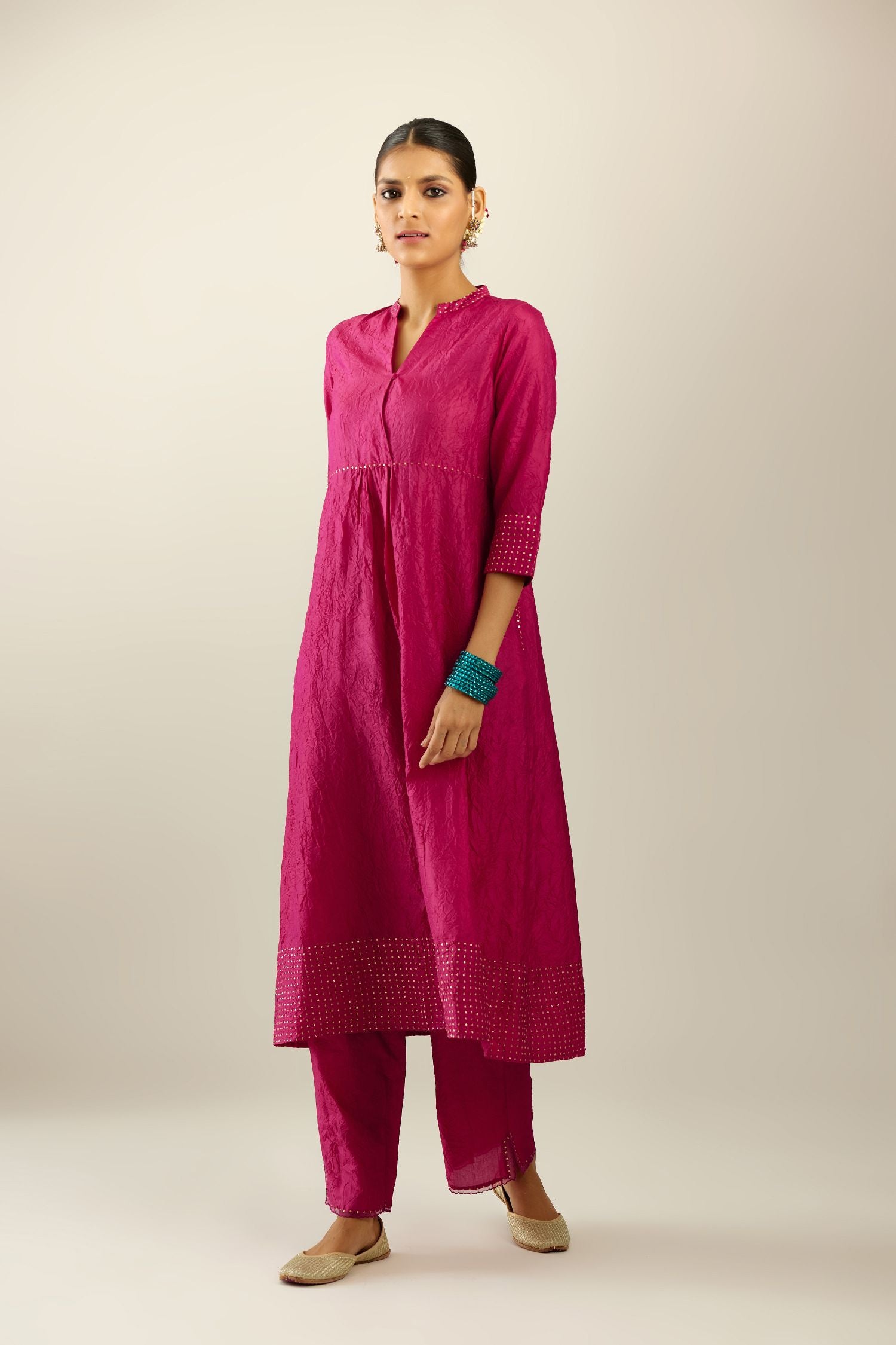 Jazzberry jam silk hand crushed kurta set, highlighted with sequins.