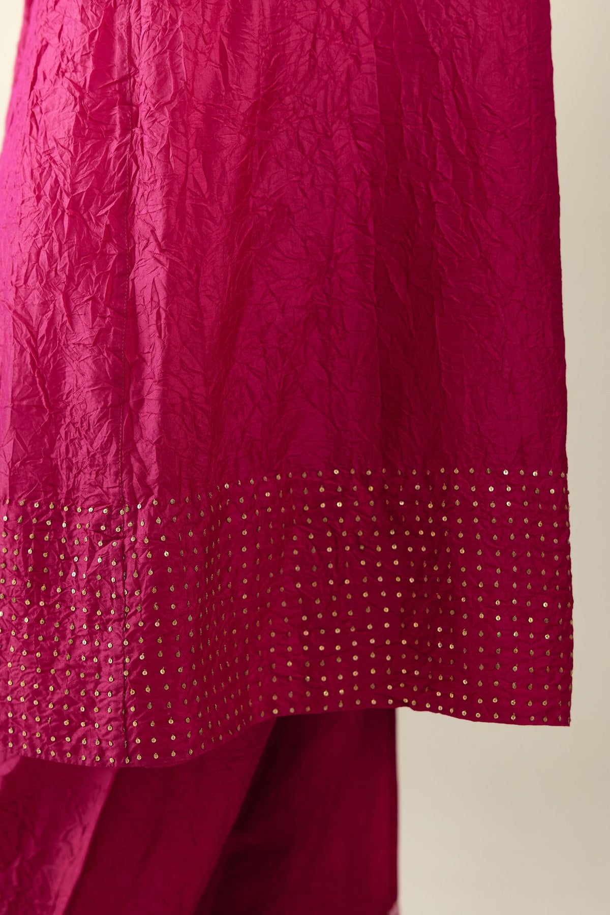Jazzberry jam silk hand crushed kurta set, highlighted with sequins.