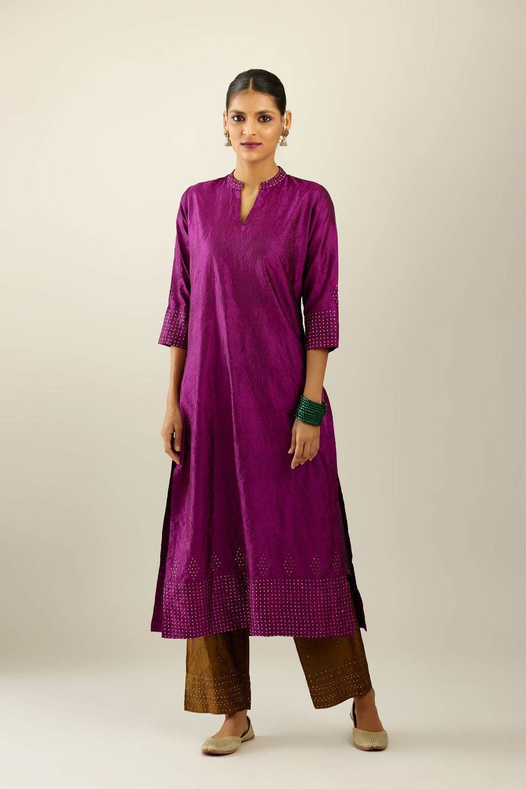 Sangria silk hand crushed kurta set with collar neckline, highlighted with gold sequins.