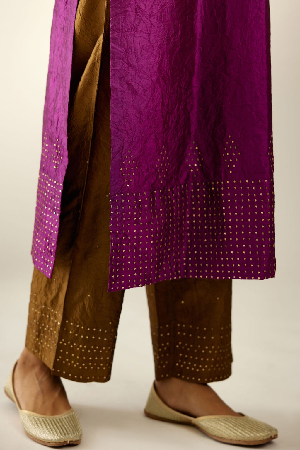 Sangria silk hand crushed kurta set with collar neckline, highlighted with gold sequins.