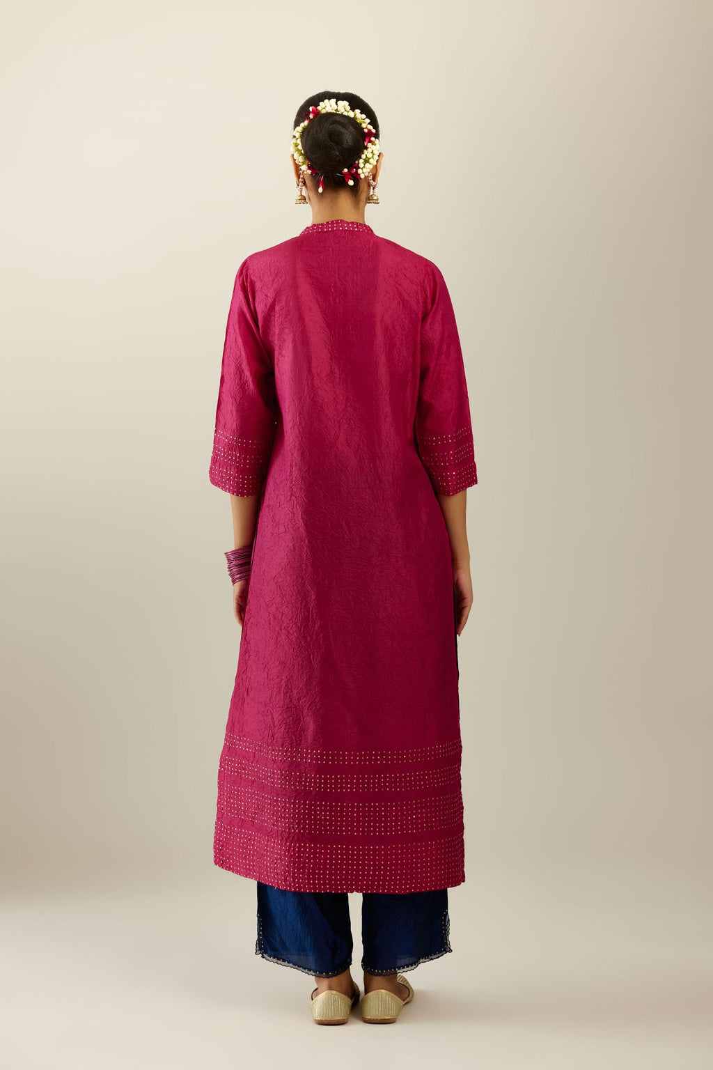 Jazzberry jam silk hand crushed kurta with collar neckline, highlighted with gold sequins.
