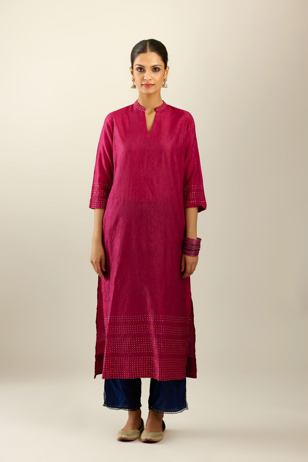 Jazzberry jam silk hand crushed kurta with collar neckline, highlighted with gold sequins.