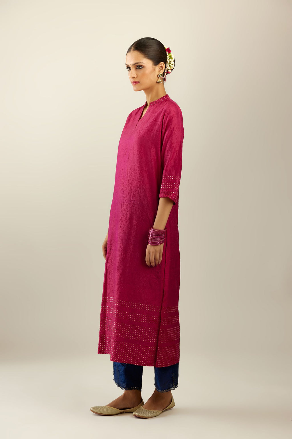 Jazzberry jam silk hand crushed kurta with collar neckline, highlighted with gold sequins.