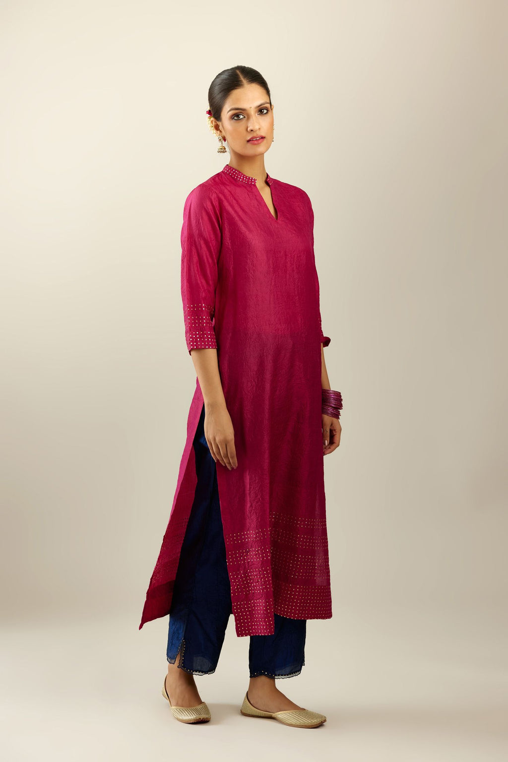 Jazzberry jam silk hand crushed kurta with collar neckline, highlighted with gold sequins.