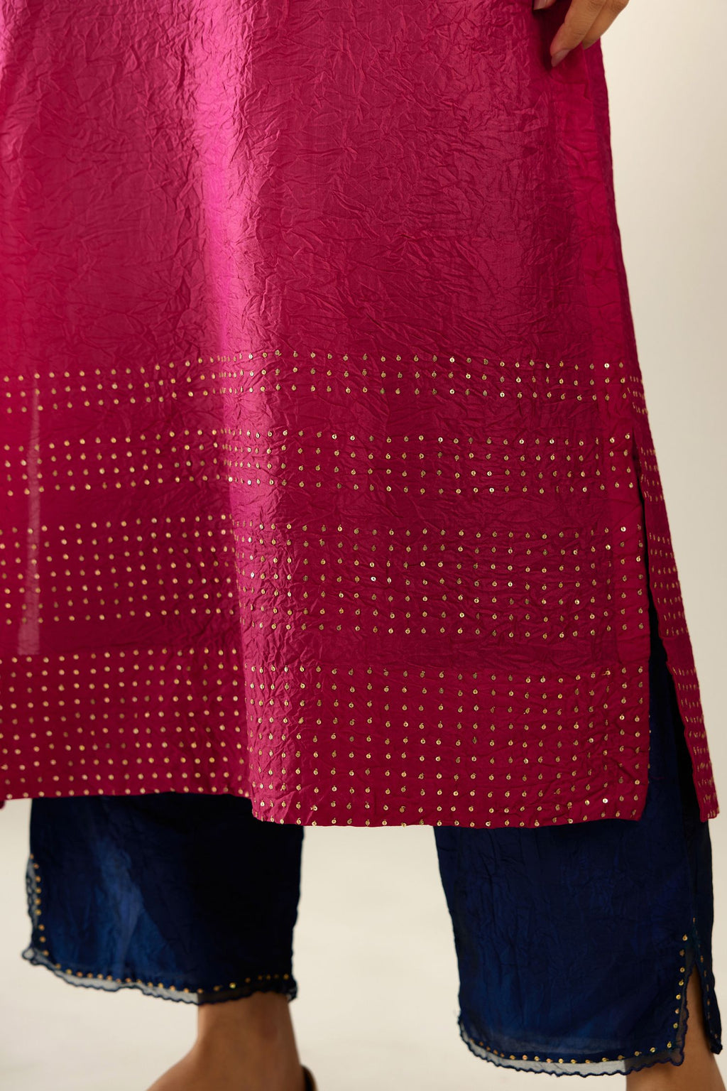 Jazzberry jam silk hand crushed kurta with collar neckline, highlighted with gold sequins.