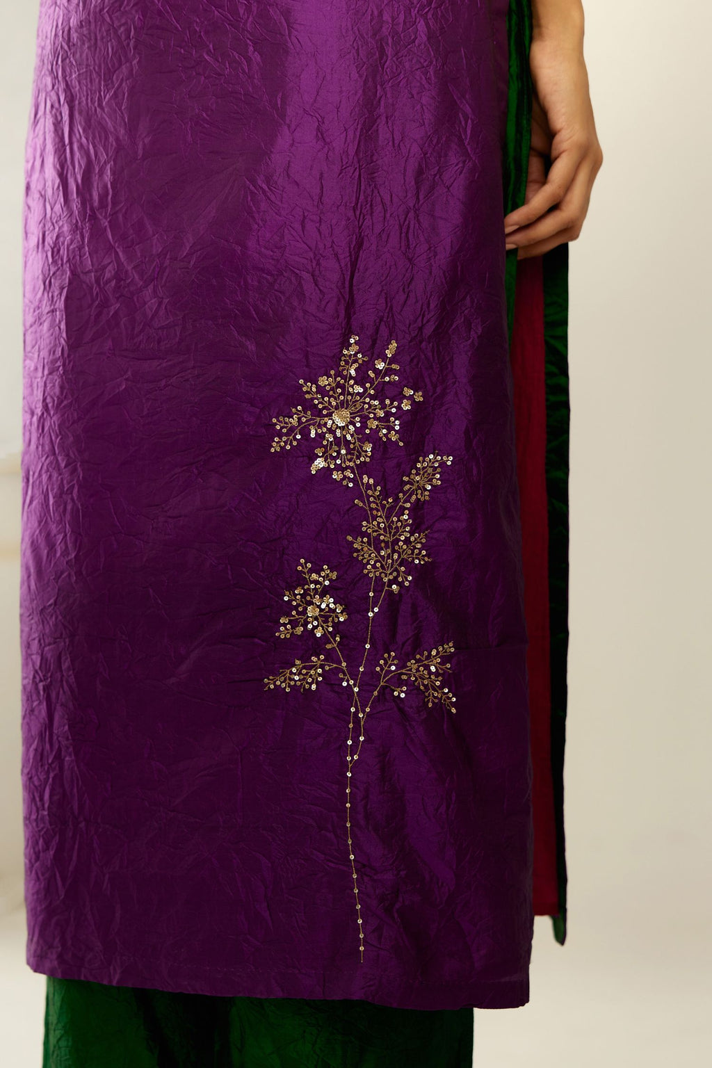 Plum purple hand crushed silk straight kurta set, highlighted with a single zari and sequins boota.