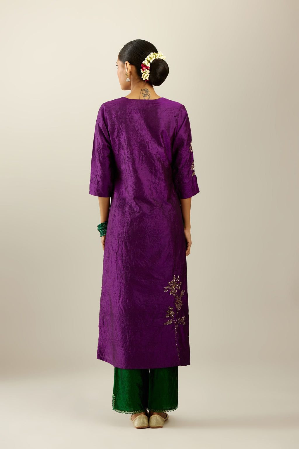 Plum purple hand crushed silk straight kurta set, highlighted with a single zari and sequins boota.