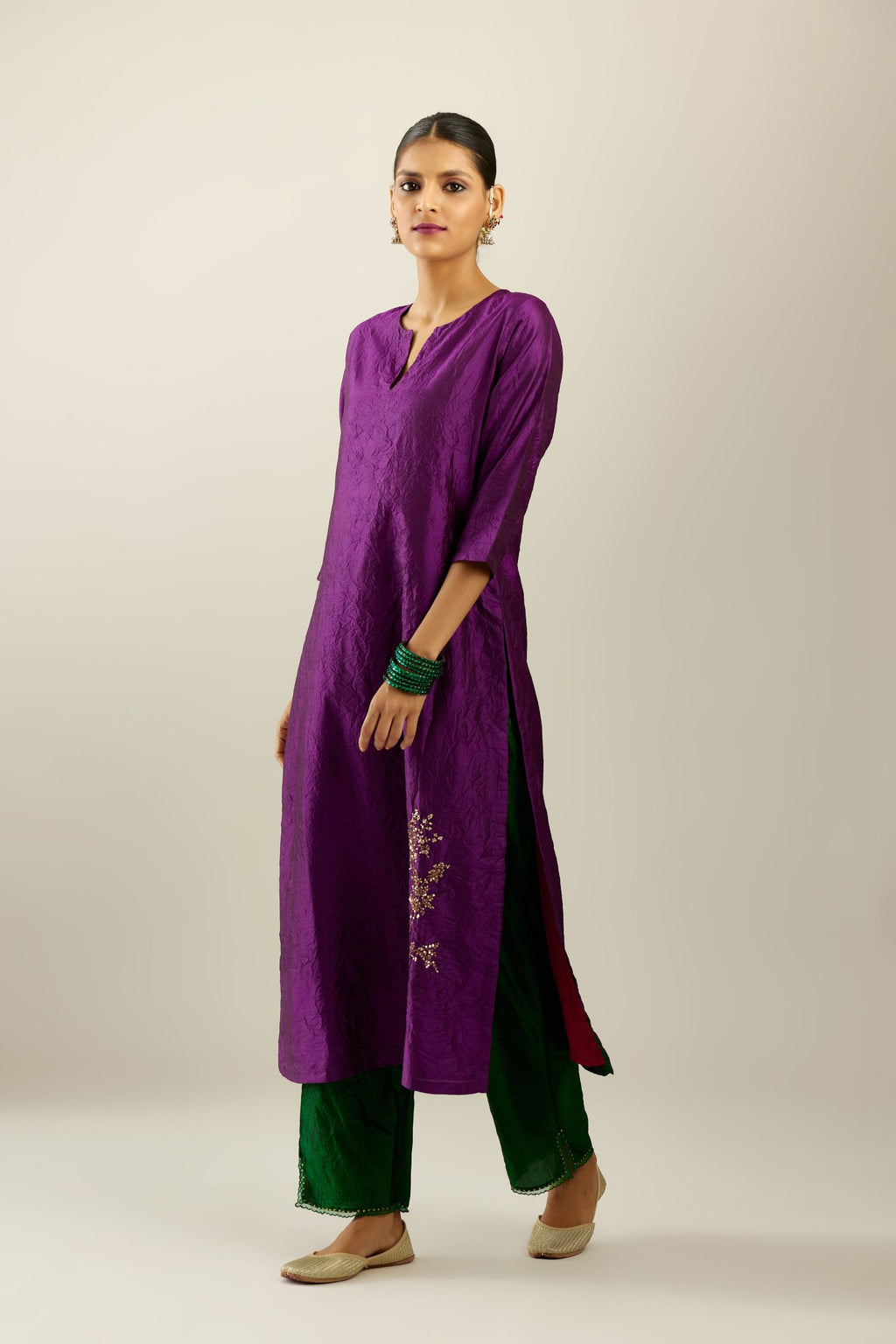 Plum purple hand crushed silk straight kurta set, highlighted with a single zari and sequins boota.