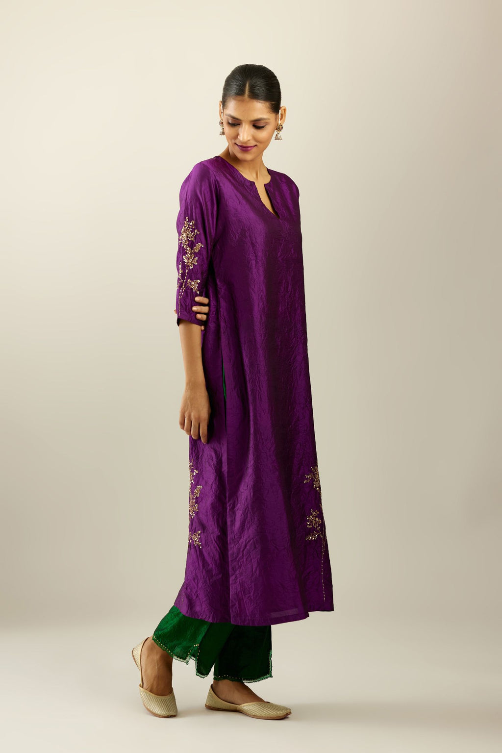 Plum purple hand crushed silk straight kurta set, highlighted with a single zari and sequins boota.