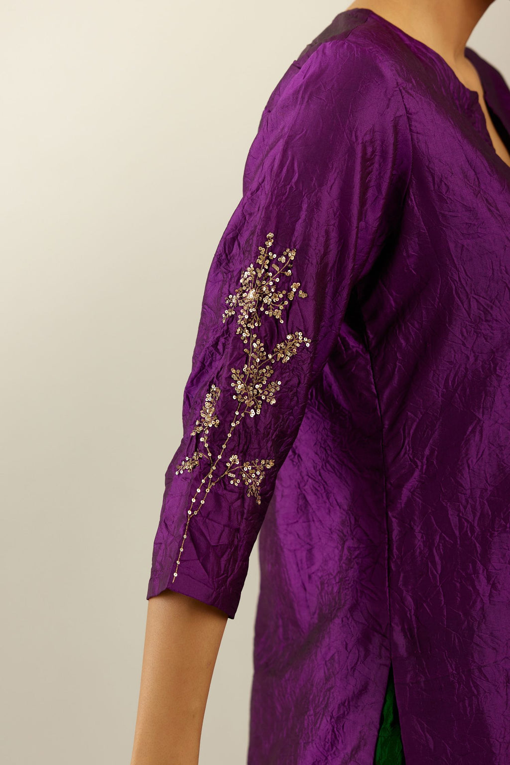 Plum purple hand crushed silk straight kurta set, highlighted with a single zari and sequins boota.