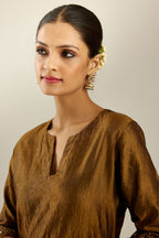 Golden olive hand crushed silk straight kurta set, highlighted with zari and sequins work at sleeve and hem.