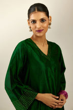 Dark green silk hand crushed easy fit straight hem kurta set, highlighted with a broad gold sequins border at hem.