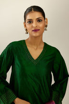 Dark green silk hand crushed easy fit straight hem kurta set, highlighted with a broad gold sequins border at hem.