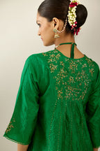 Grass green hand crushed silk kurta dress set with a V neck embroidered yoke and panels.