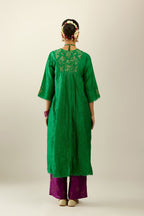 Grass green hand crushed silk kurta dress set with a V neck embroidered yoke and panels.