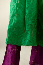 Grass green hand crushed silk kurta dress set with a V neck embroidered yoke and panels.