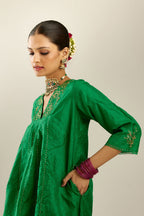 Grass green hand crushed silk kurta dress set with a V neck embroidered yoke and panels.
