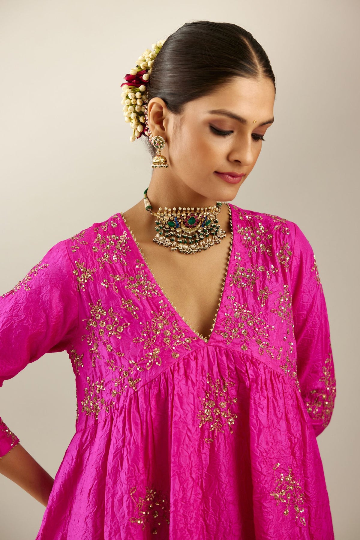 Fiji fuchsia silk hand crushed V neck gathered kurta set, highlighted with all-over gold sequins boota.