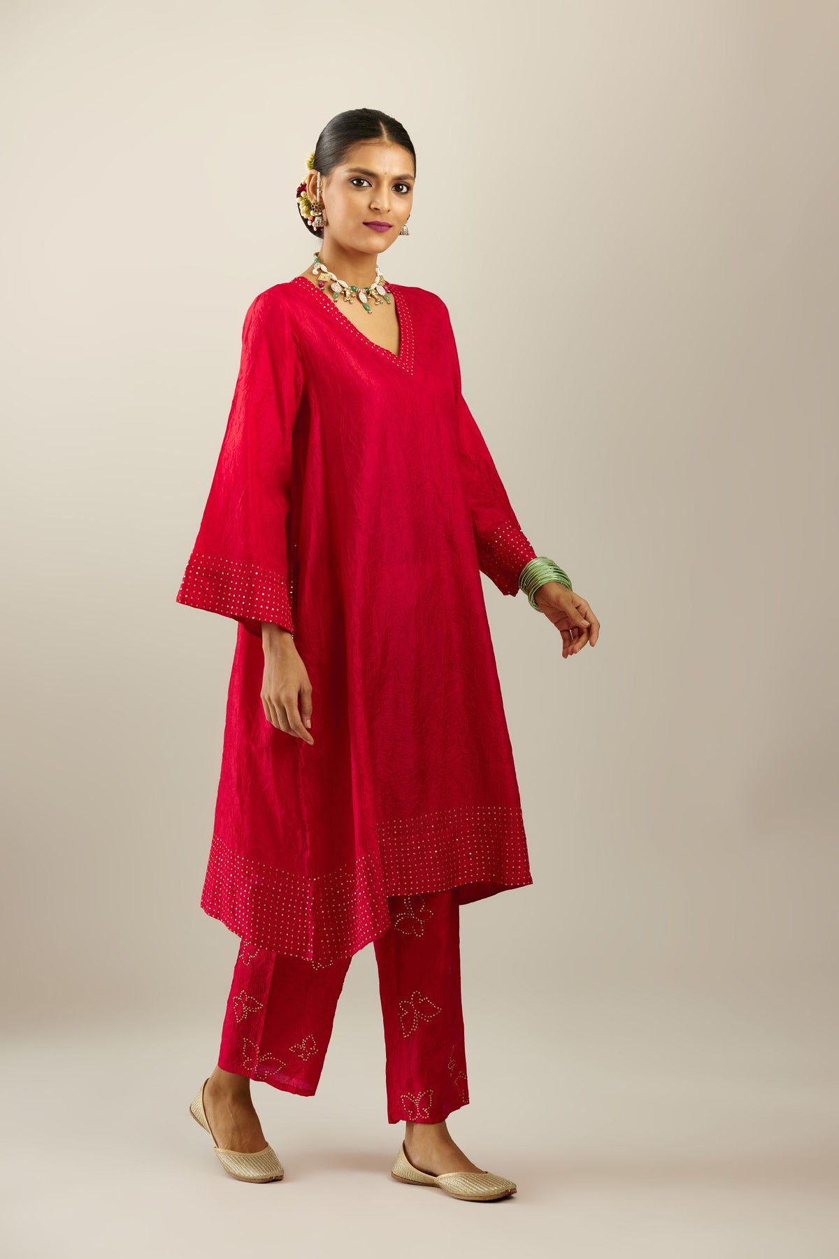 Red silk hand crushed easy fit straight hem kurta set, highlighted with a broad gold sequins border at hem
