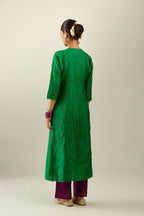 Silk hand crushed A-line kurta set, highlighted with gold sequins and embroidered scalloped edges.