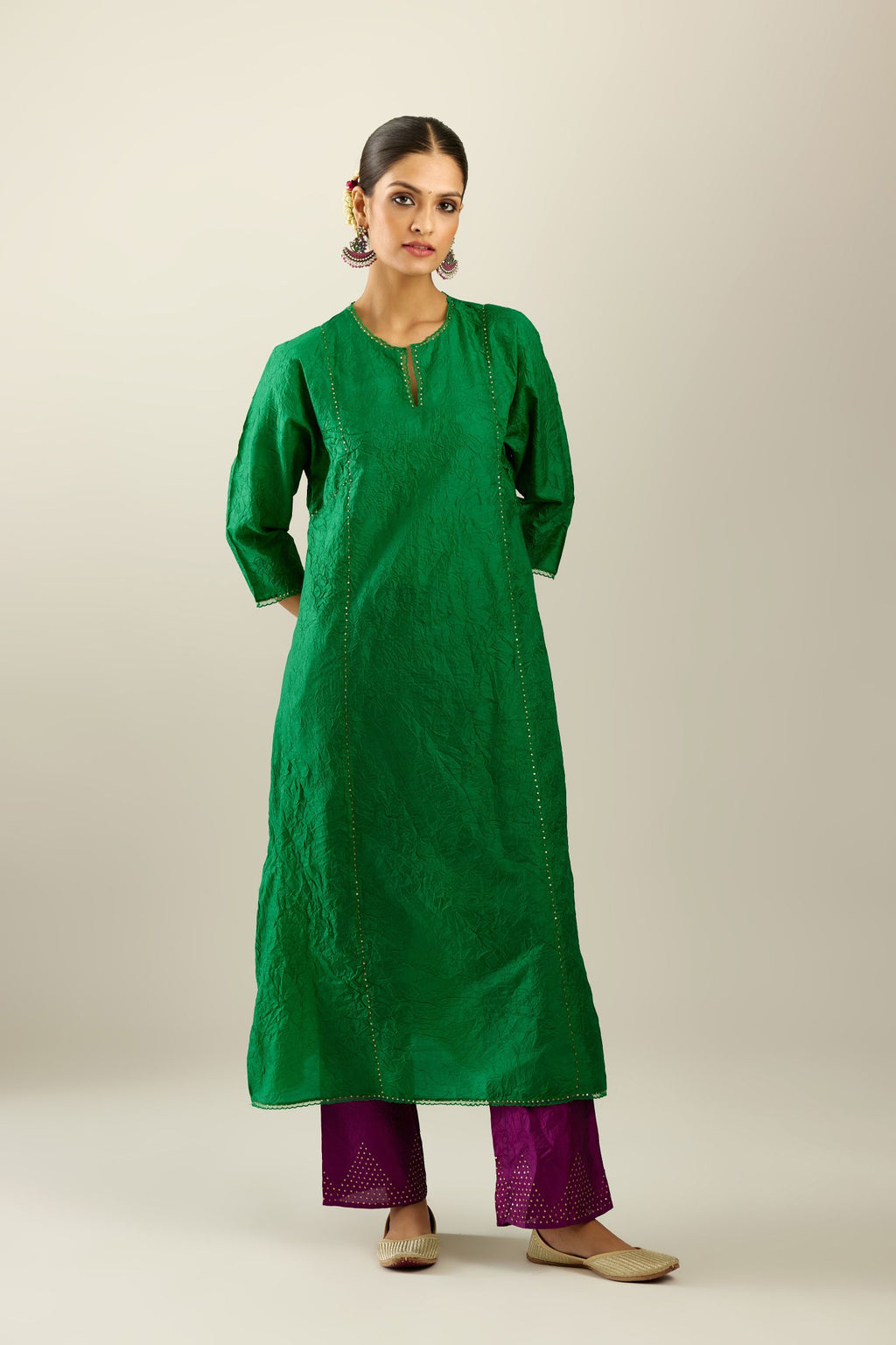 Silk hand crushed A-line kurta set, highlighted with gold sequins and embroidered scalloped edges.