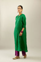 Silk hand crushed A-line kurta set, highlighted with gold sequins and embroidered scalloped edges.