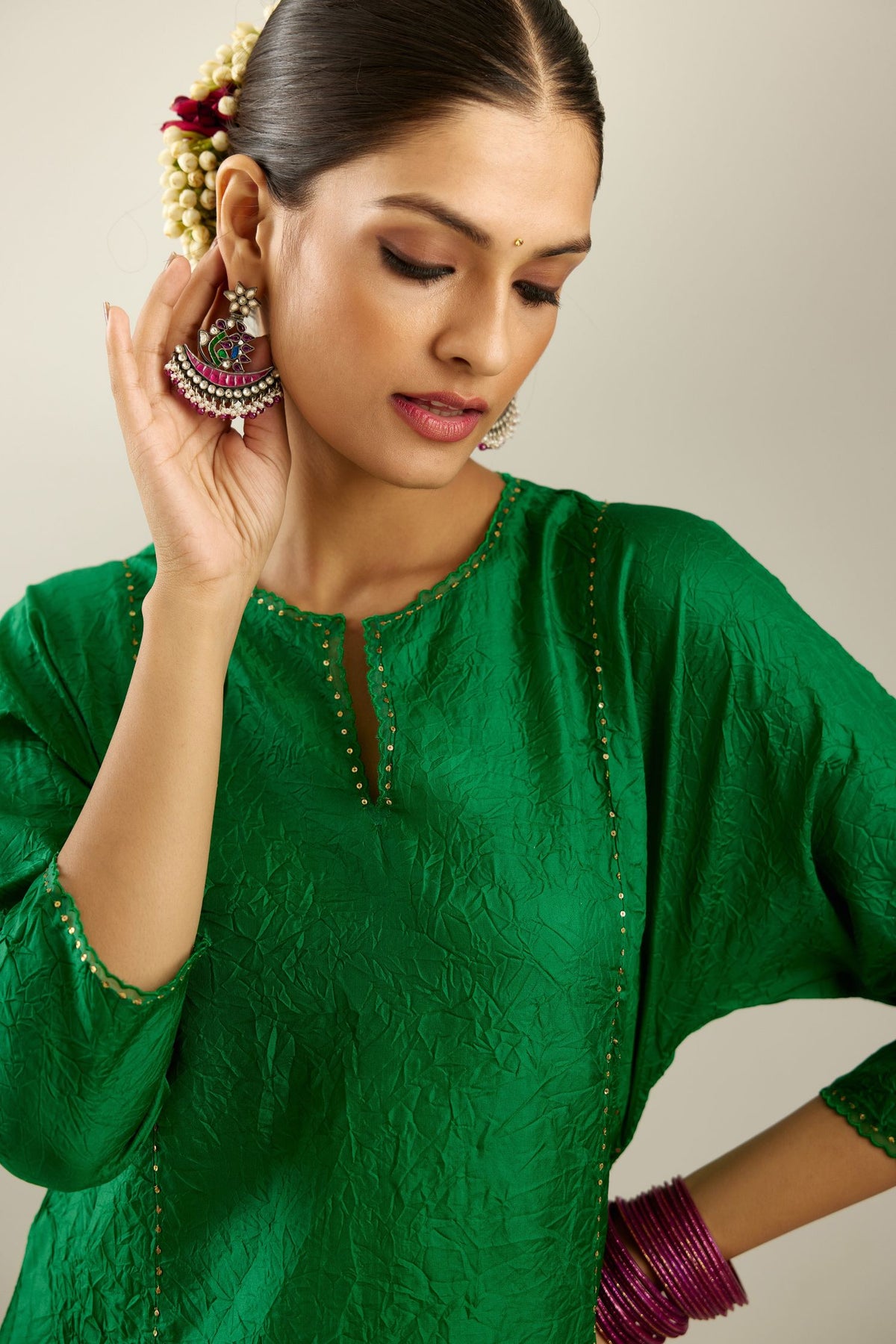 Silk hand crushed A-line kurta set, highlighted with gold sequins and embroidered scalloped edges.