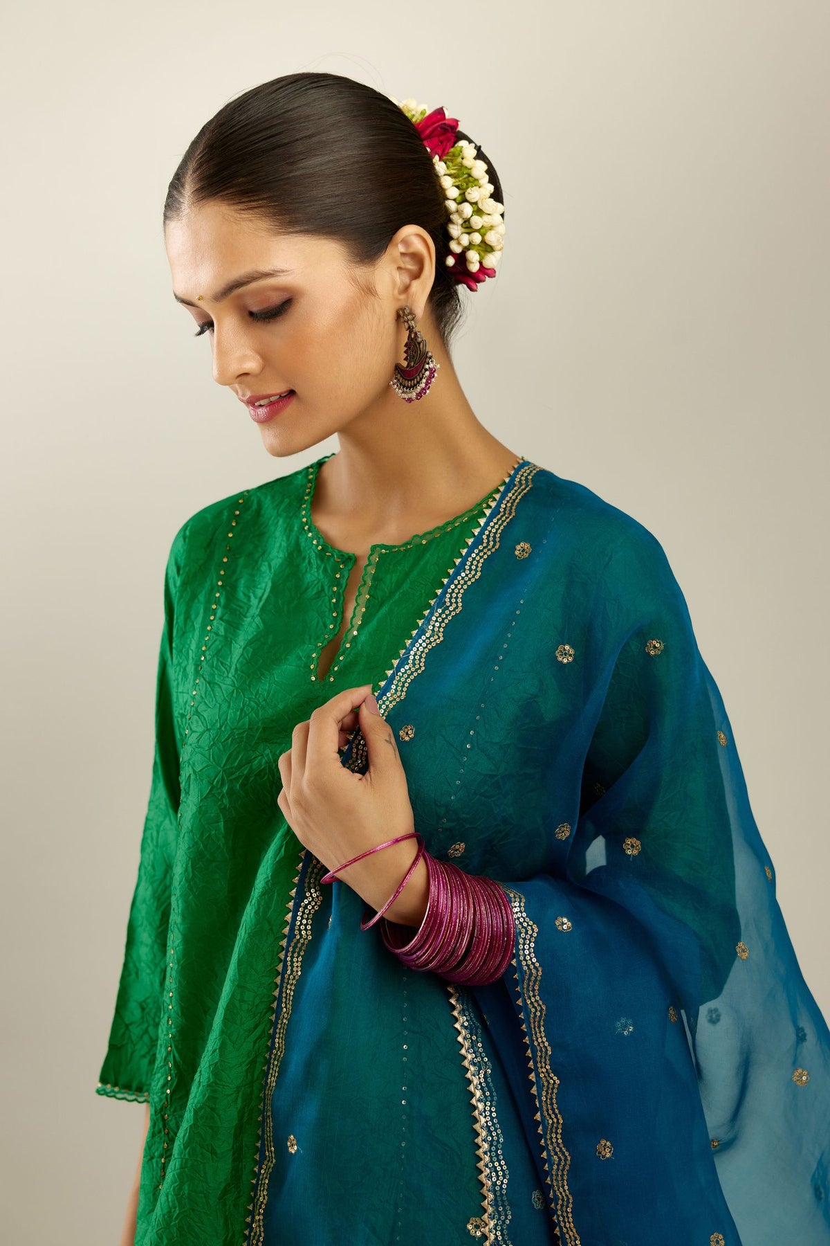 Silk hand crushed A-line kurta set, highlighted with gold sequins and embroidered scalloped edges.