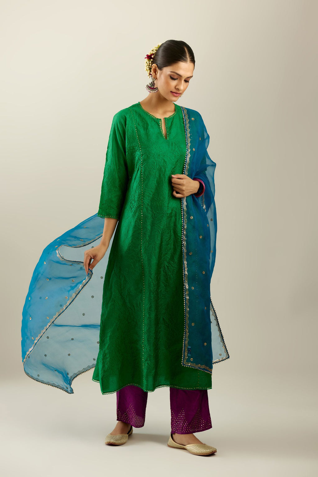 Silk hand crushed A-line kurta set, highlighted with gold sequins and embroidered scalloped edges.