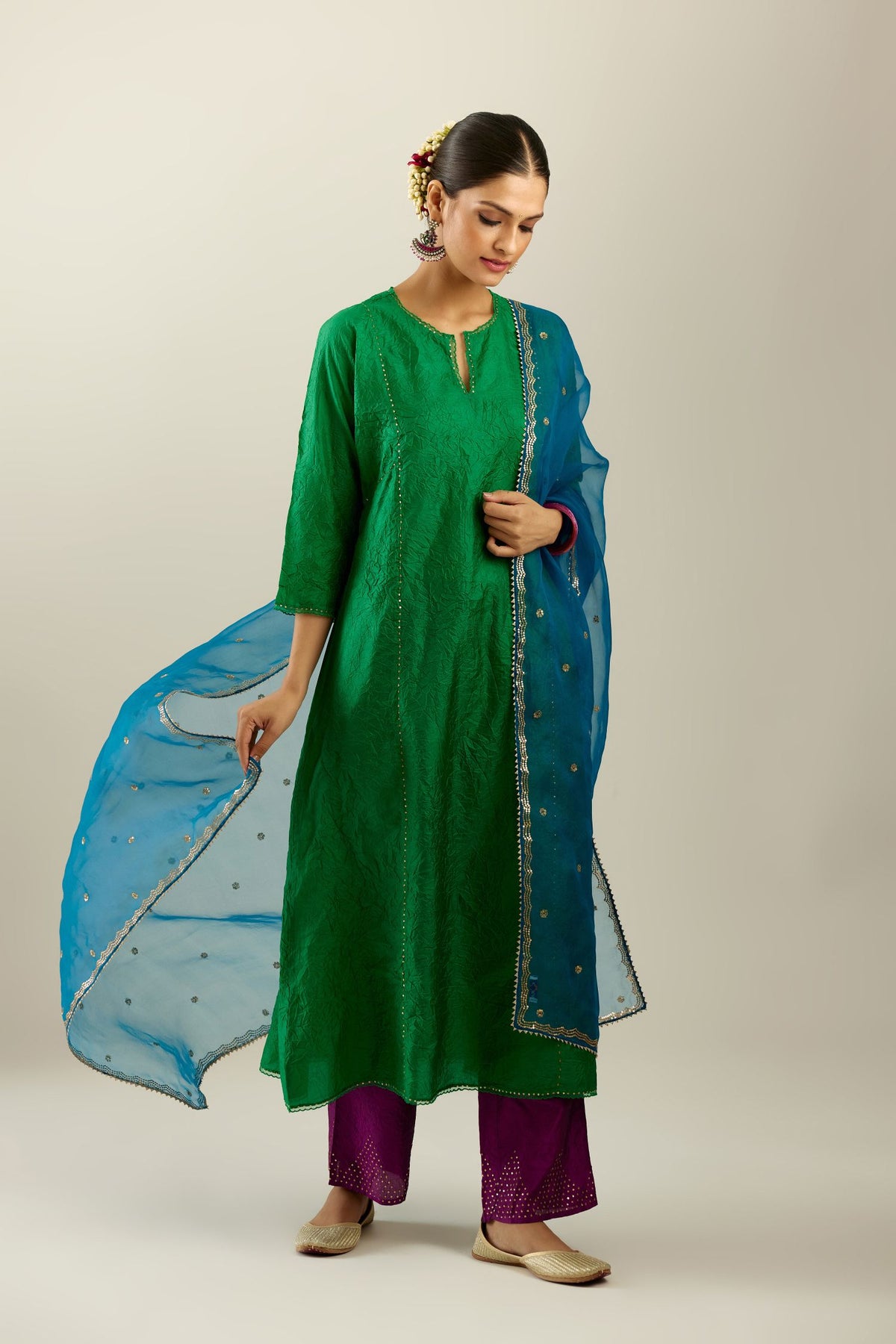 Silk hand crushed A-line kurta set, highlighted with gold sequins and embroidered scalloped edges.