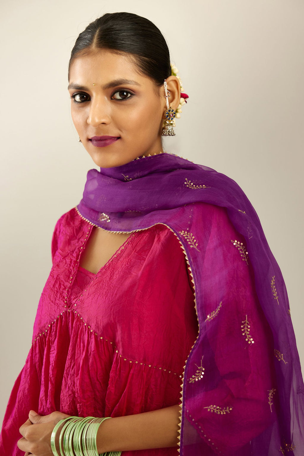 Raspberry silk hand crushed V neck gathered kurta set, highlighted with gold sequins and embroidered scalloped organza at edges.