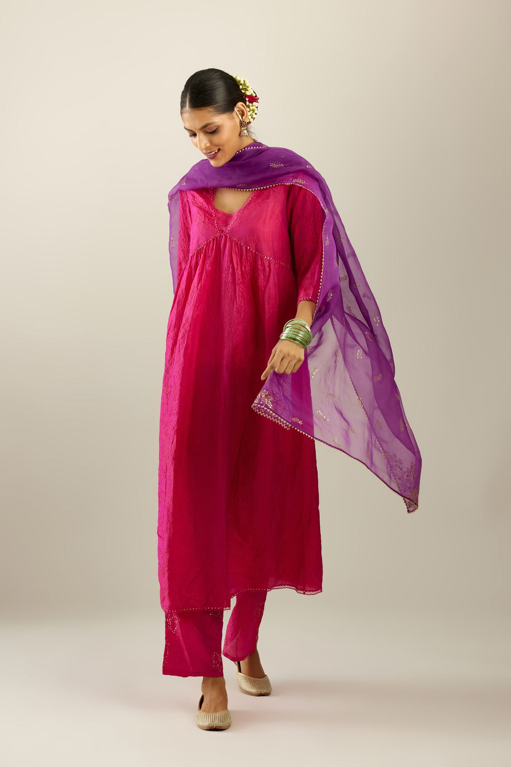 Raspberry silk hand crushed V neck gathered kurta set, highlighted with gold sequins and embroidered scalloped organza at edges.