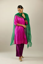 Fiji fuchsia silk hand crushed short kurta set with concealed button placket neckline, highlighted with gold sequins.