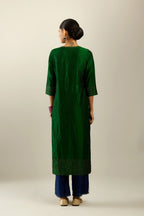 Dark green silk hand crushed kurta set with concealed button placket neckline, highlighted with gold sequins.