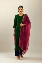 Dark green silk hand crushed kurta set with concealed button placket neckline, highlighted with gold sequins.