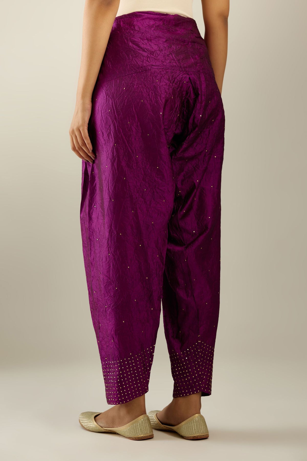 Sangria hand crushed pure silk narrow salwar detailed with gold sequins at hem.