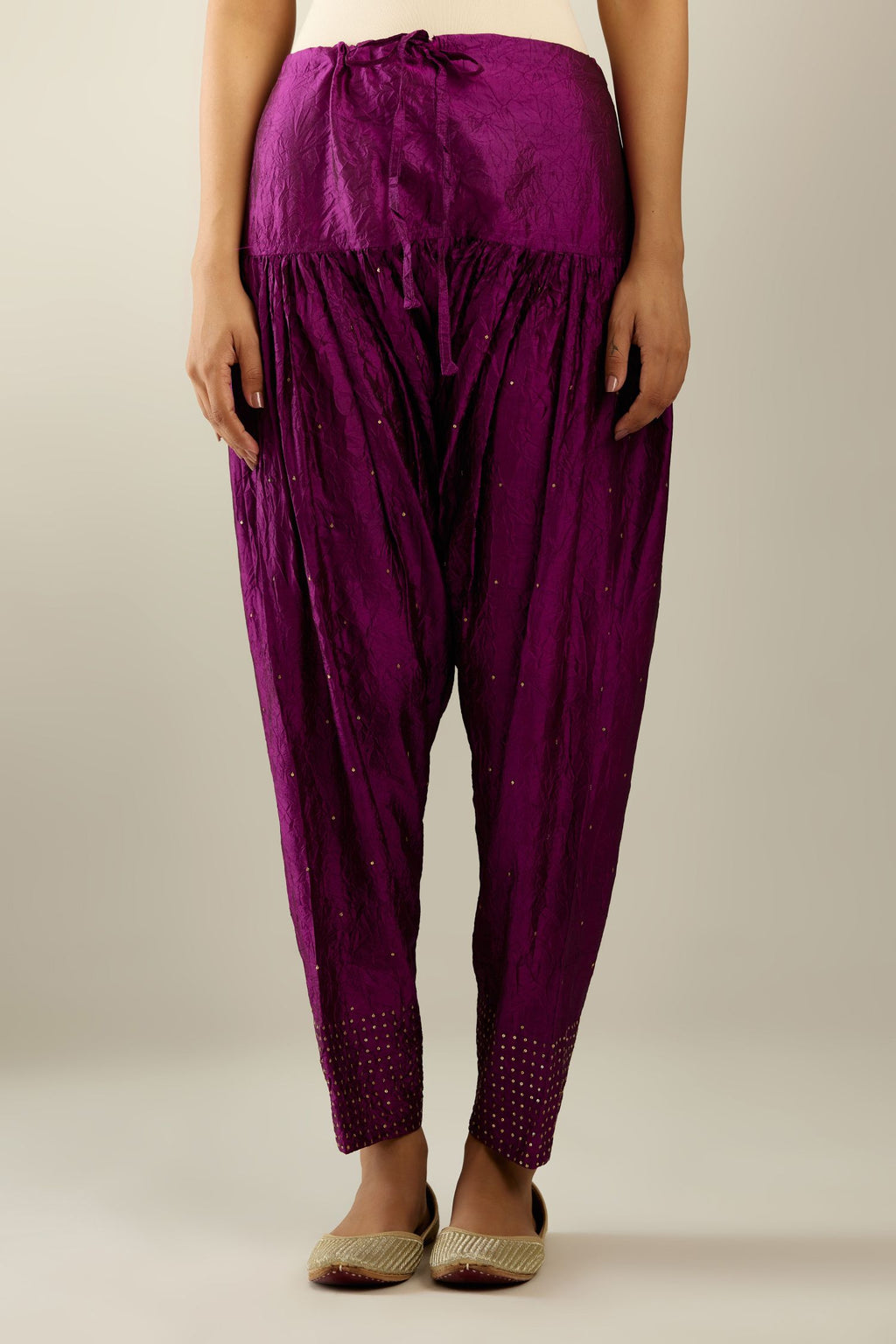 Sangria hand crushed pure silk narrow salwar detailed with gold sequins at hem.