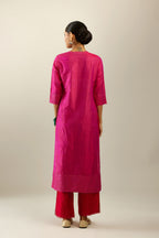 Raspberry silk hand crushed kurta set with concealed button placket neckline, highlighted with gold sequins.