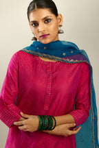 Raspberry silk hand crushed kurta set with concealed button placket neckline, highlighted with gold sequins.